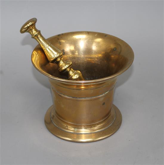 A 17th century style bronze pestle and mortar, height 12cm diameter 15.5cm, pestle 18cm